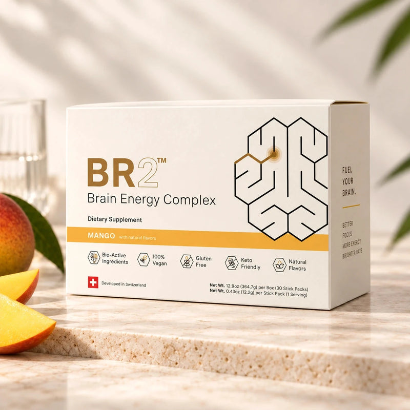 BR2 Brain Energy Complex Mango box with mango slices on a warm stone counter